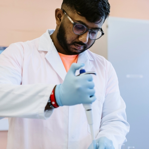 A student working in the Biochemistry and Biology lab