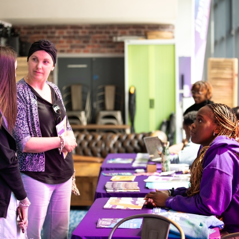 Parents and students talking with staff at the information fair - Open Day 2023