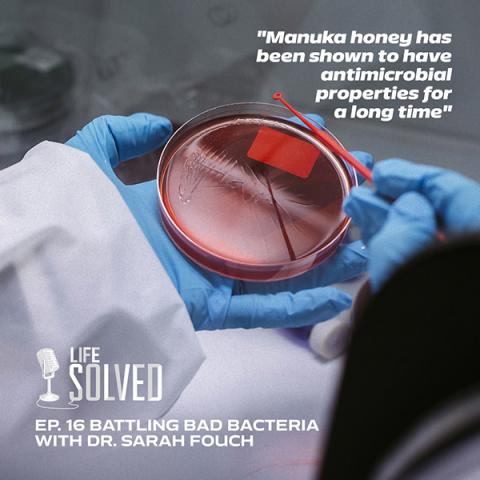 Person holding petri dish - life solved logo in left corner