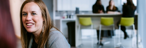 Female University of Portsmouth employee in meeting room