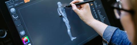 student drawing on wacom