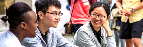 marketing students talking in a crowd
