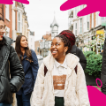 Happy students walking through Portsmouth 