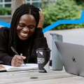 Postgraduate students working outside together